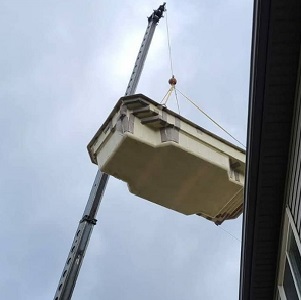 Crane Over House with Fiberglass Pool